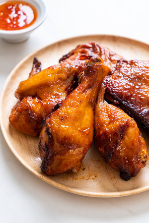 grilled and barbecue chicken on tableの写真素材