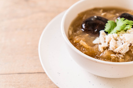 Braised Fish Maw in Red Gravy Soup with Crab in bowlの写真素材