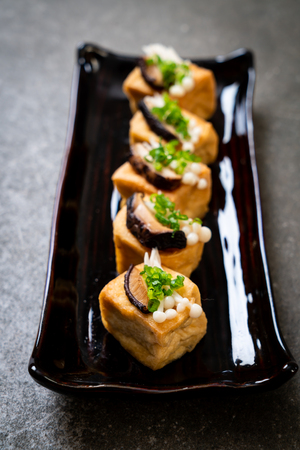 Grilled Tofu with Shitake Mushroom and Golden Needle Mushroom - healthy, vegan or vegetarian food styleの写真素材