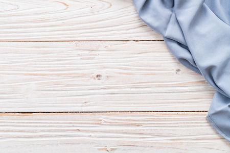 kitchen cloth (napkin) on wood backgroundの写真素材