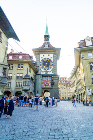 Bern, Switzerland - 23 AUG 2018: People on the shopping alley with the Zytglogge astronomical clock...