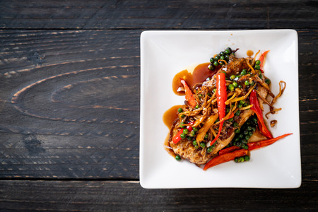 stir-fried spicy and herb with grouper fish fillet  - Thai food styleの写真素材