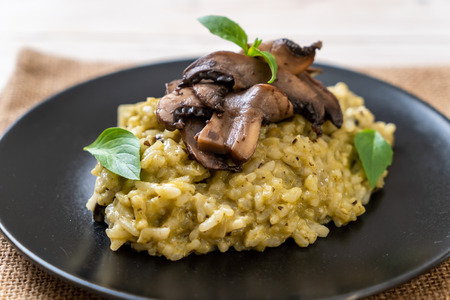 Homemade Mushroom Risotto with Pesto and Cheeseの写真素材