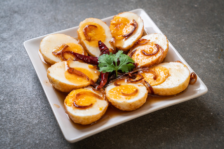 Fried Boiled Egg with Tamarind Sauce or Sweet and Sour Eggsの写真素材