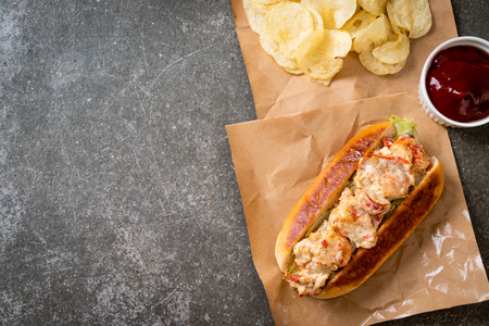homemade lobster roll with potato chipsの写真素材