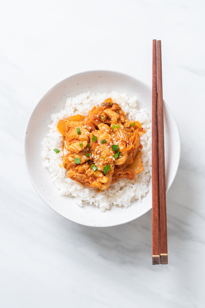 stir-fried pork with kimchi on topped rice - Korean food styleの写真素材