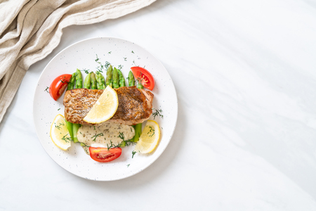 grilled snapper fish steak with vagetableの写真素材