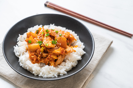 stir-fried pork with kimchi on topped rice - Korean food styleの写真素材