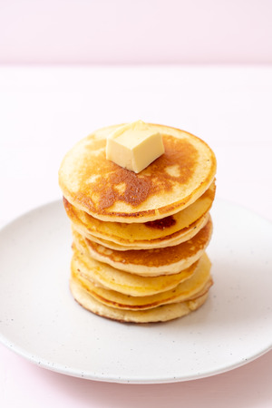 pancakes stack with butter and honeyの写真素材