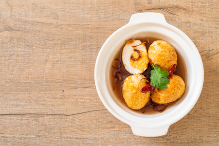 Fried Boiled Egg with Tamarind Sauce or Sweet and Sour Eggsの写真素材