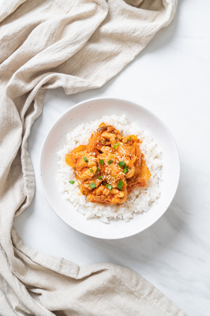 stir-fried pork with kimchi on topped rice - Korean food styleの写真素材