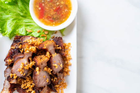 Fried Streaky Pork or Crispy Pork or Deep Fried Pork Belly with Garlicの写真素材