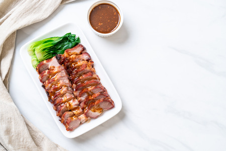 roast barbecue red pork  with sauceの写真素材