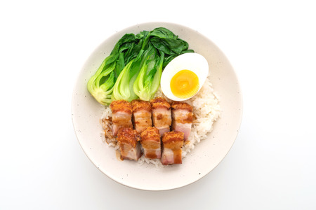 crispy pork belly on topped rice isolated on white background - Asian food styleの写真素材