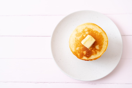 pancakes stack with butter and honeyの写真素材