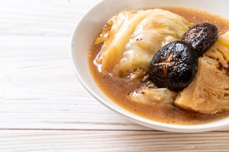 boiled cabbage in red soup with mushroom - vegan and vegetarian food in Asian styleの写真素材