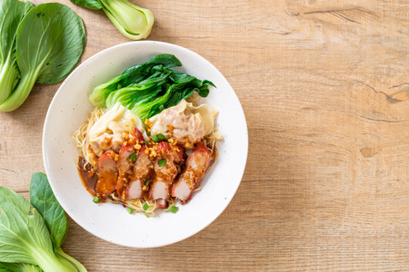 egg noodle with red roasted pork and wonton - Asian food styleの写真素材