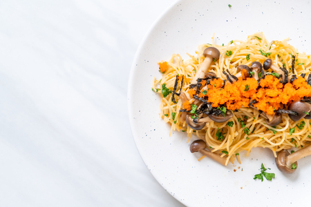 spaghetti with mushrooms, shrimp egg and seaweed  - fusion food styleの写真素材