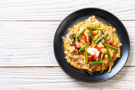 Stir-Fried Squid or Octopus with Salted Eggs - Asian seafood styleの写真素材