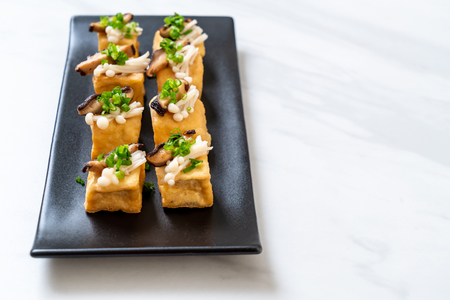 Grilled Tofu with Shitake Mushroom and Golden Needle Mushroom - healthy, vegan or vegetarian food styleの写真素材