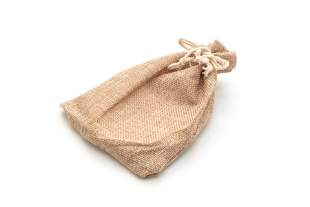 sack fabric bag isolated on white backgroundの写真素材