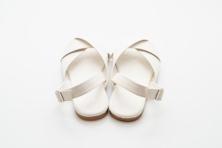 fashion female and woman leather sandals with slingback isolated on white backgroundの写真素材