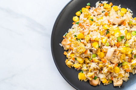 homemade fried rice with chickenの写真素材