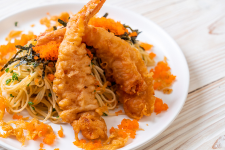spaghetti with tempura shrimps and shrimp egg - fusion foodの写真素材