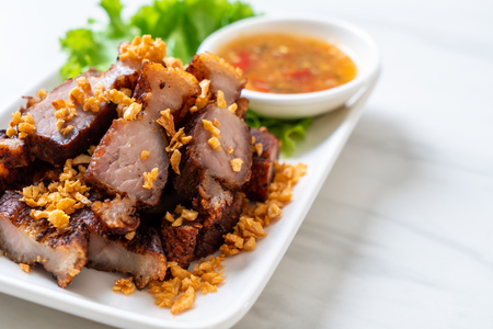 Fried Streaky Pork or Crispy Pork or Deep Fried Pork Belly with Garlicの写真素材