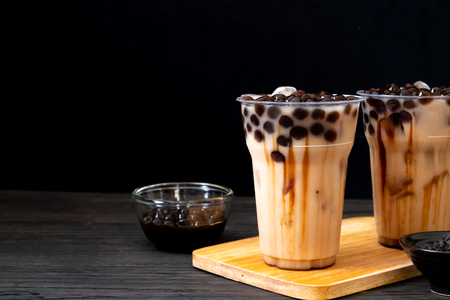 Taiwan milk tea with bubble on wood backgroundの写真素材
