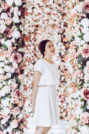 beautiful Asian woman with flower arches - valentine conceptの写真素材