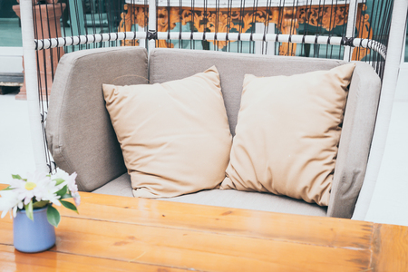 Comfortable pillow on sofa decoration outdoor patioの写真素材