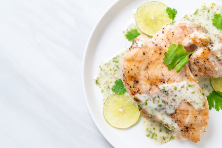 grilled chicken breast with lemon lime sauceの写真素材