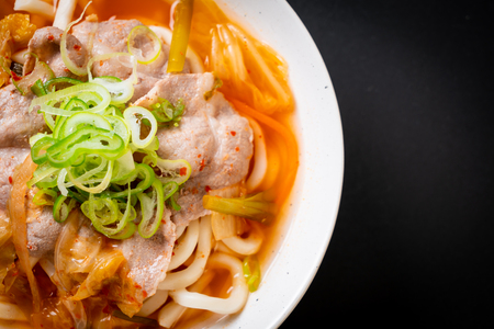 udon ramen noodle with pork and kimchi - korean and japanese food styleの写真素材