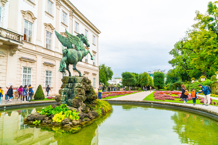 Salzburg, Austria - AUGUST 30, 2018: Tourists Walking Around Mirabell Palace and Gardensのeditorial素材