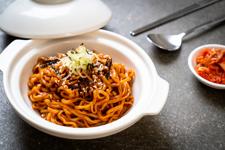 Korean hot and spicy instant noodle with kimchi - korean food styleの写真素材