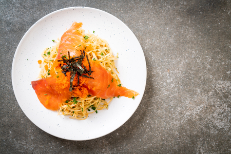 spaghetti with smoked salmon and shrimp egg - fusion food styleの写真素材