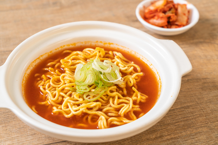 korean spicy instant noodles with kimchi - korean food styleの写真素材