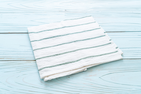 kitchen cloth (napkin) on blue wooden background with copy spaceの写真素材