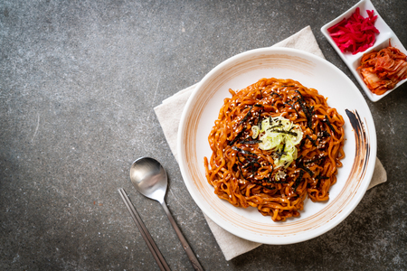 Korean hot and spicy instant noodle with kimchi - korean food styleの写真素材