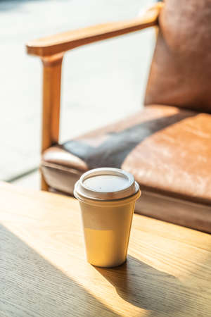 hot coffee paper cup in coffee shop and cafeの写真素材