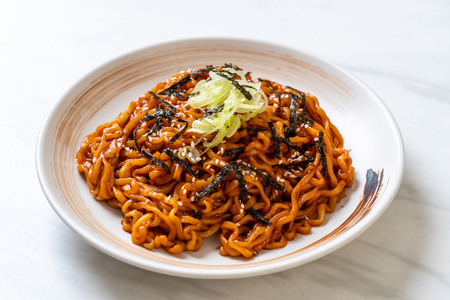 Korean hot and spicy instant noodle with kimchi - korean food styleの写真素材