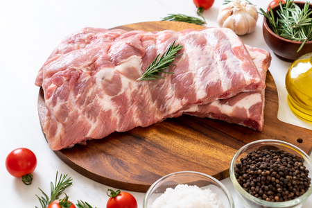 Fresh raw pork ribs with ingredientsの写真素材