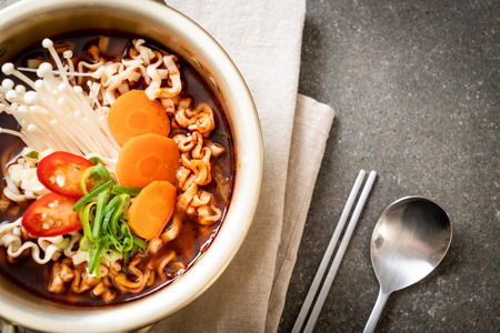 korean instant noodles in golden pot - korean food styleの写真素材