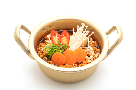 korean instant noodles in golden pot - korean food style isolated on white backgroundの写真素材