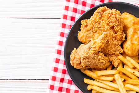 fried chicken with french fries and nuggets meal - junk food and unhealthy foodの写真素材