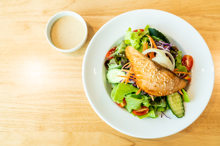 fried salmon salad - healthy food styleの写真素材