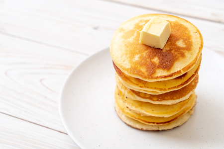 pancakes stack with butter and honeyの写真素材
