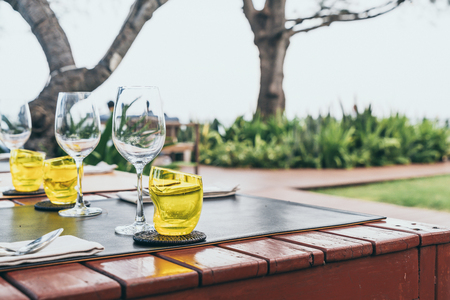glass set on dinning table - selective focus pointの写真素材