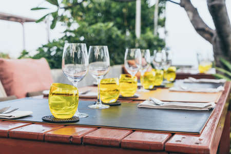 glass set on dinning table - selective focus pointの写真素材